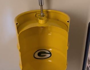 Former Vikings QB Tommy Kramer Upgraded His Packers Urinal and Added a Picture of an Injured Aaron Rodgers