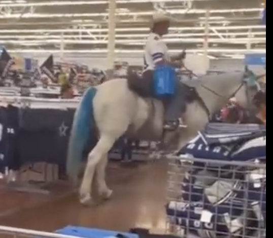Dallas Cowboys Fan Celebrates First Win Horseback in Walmart!