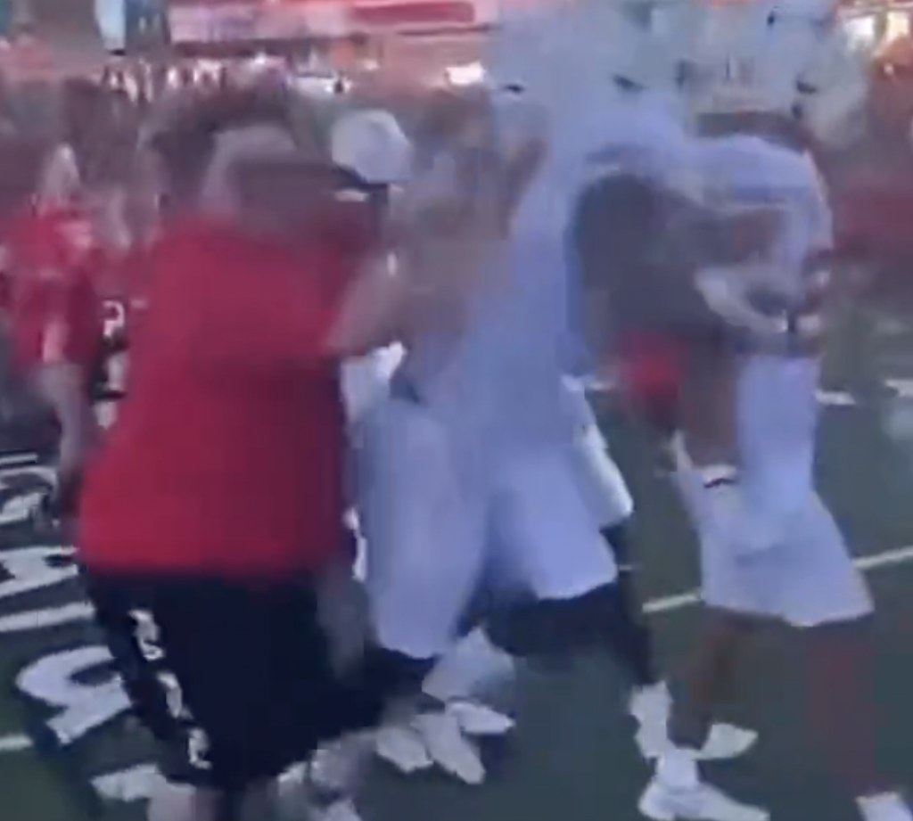 Red Raiders Fan Pushes Longhorn’s Player!
